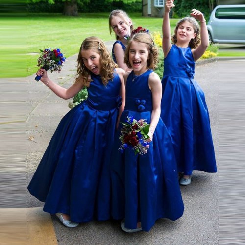 A-Line Round Neck Tea-Length Royal Blue Pleated Satin Flower Girl Dress with Flowers